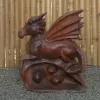 Product image 6 of the product “Dragon with leg lifted on the left made from suar wood, about 50cm Height ”